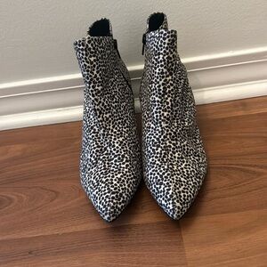 Black and white spotted ankle booties. Low heel